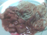 Lamelles d encornets en sauce tomates