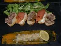 Carpaccio de langoustines sur coulis de carottes et ses toasts