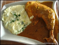 Cuisses de poulet au lait de coco et aux pices