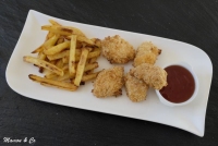 Nuggets de poulet sauce aigre douce et frites pices au four