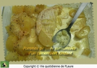 Pommes de terre surmontes d  un camembert fondant